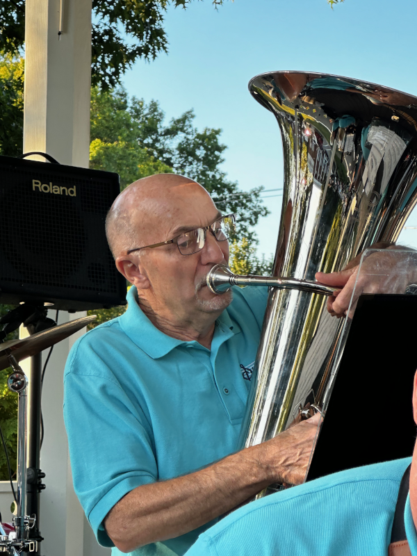 SwingTime musician playing tuba at Canfield on the Green concert